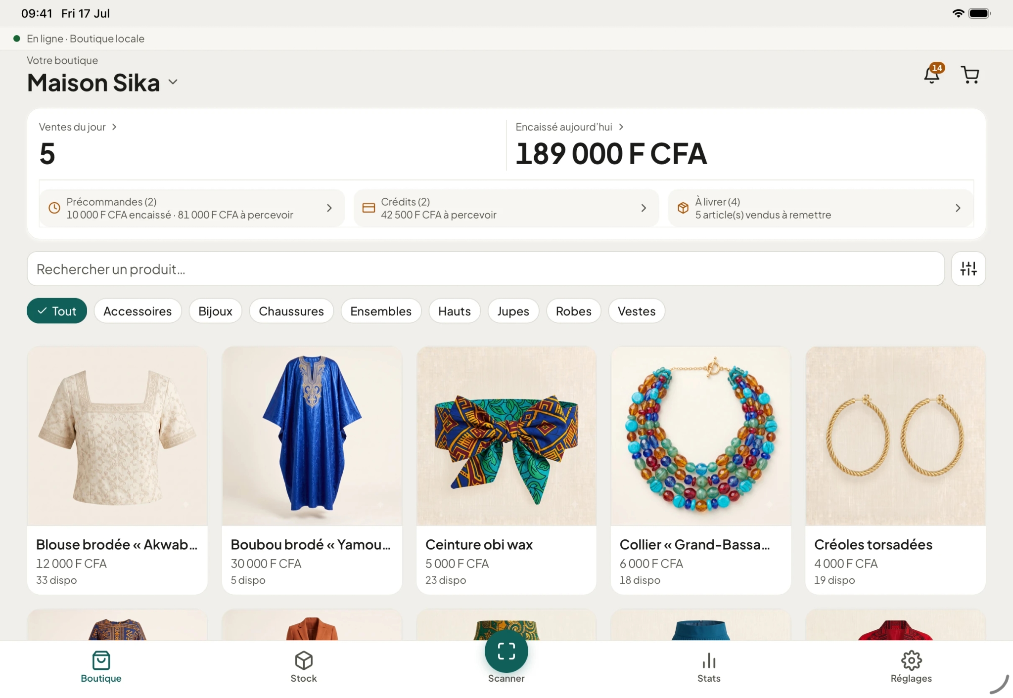 Boutik sur iPad au comptoir : vitrine en cinq colonnes, recherche, catégories.